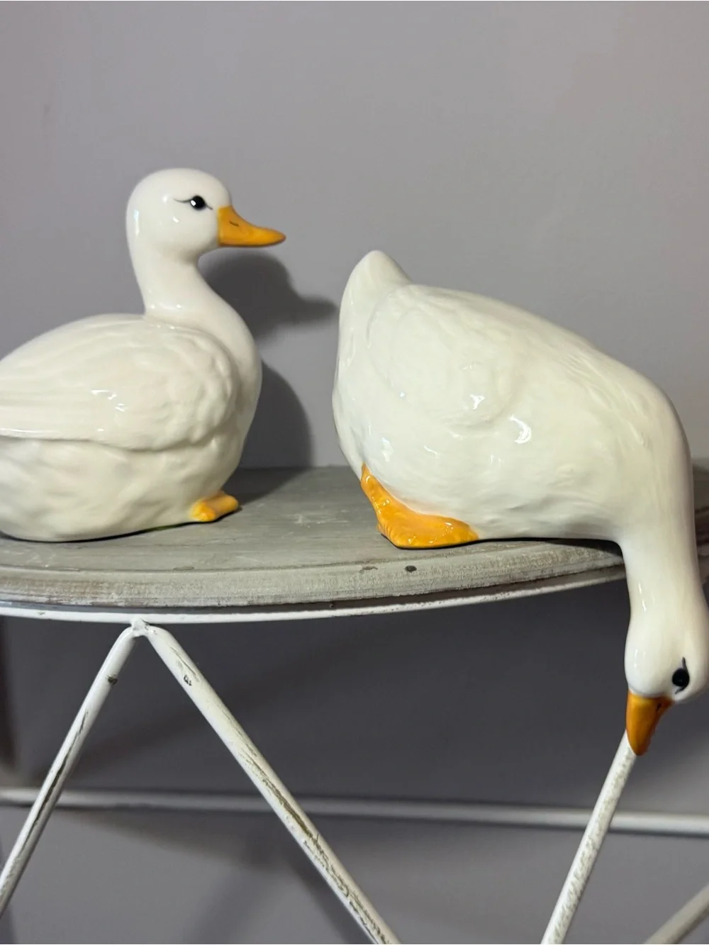Glossy White Ceramic Duck Figurine Pair with Yellow Beaks